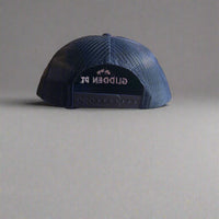 Blue cap with 'Glidden PT' logo on a gray background
